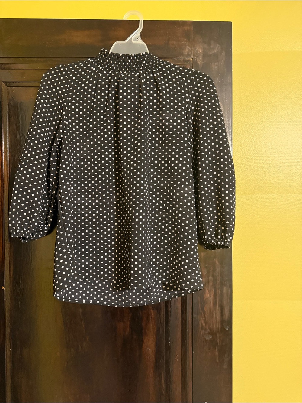 Black and white polka dot blouse